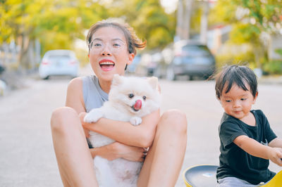 Portrait of woman with dog