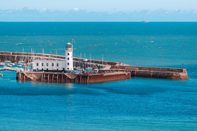 Scenic view of sea against blue sky