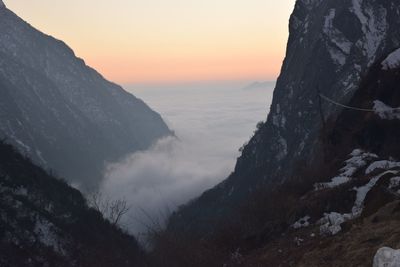 Idyllic shot of mountains in foggy weather