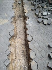 High angle view of stones on footpath