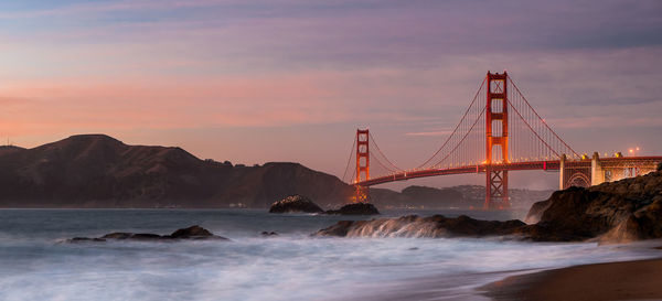 View of golden gate bridge against cloudy sky