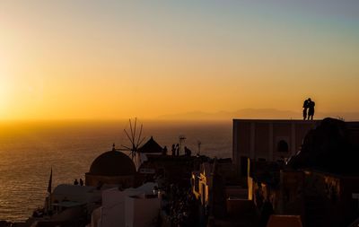 Silhouette of buildings at sunset