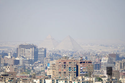 Cityscape against clear sky