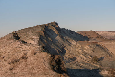 Rock formations in desert against sky