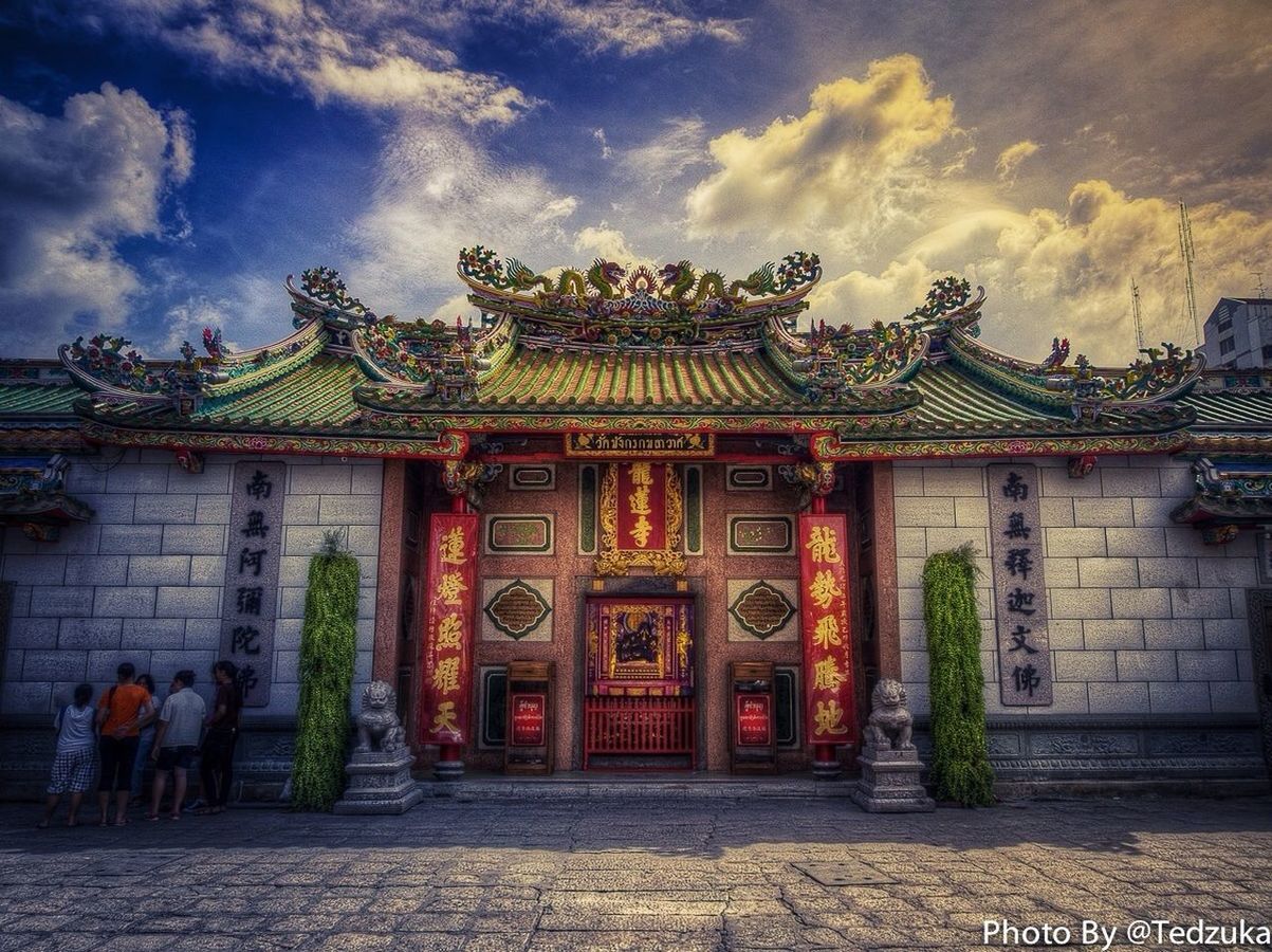 architecture, built structure, building exterior, sky, cloud - sky, facade, person, place of worship, entrance, men, cloud, temple - building, outdoors, religion, history, tradition, cultures, spirituality, house