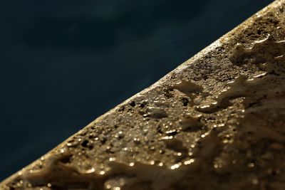 Close-up of metal against black background