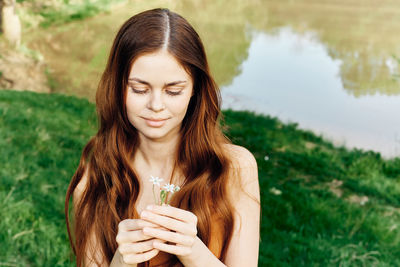 Young woman using mobile phone