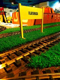 High angle view of railroad tracks on field