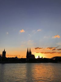 View of buildings against sky during sunset