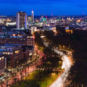 High angle view of illuminated buildings in city
