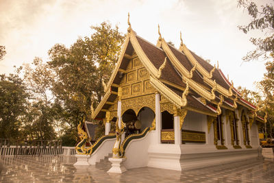 Low angle view of a temple against building