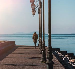 Scenic view of pier over sea against sky