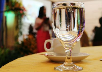 Close-up of wine glass on table