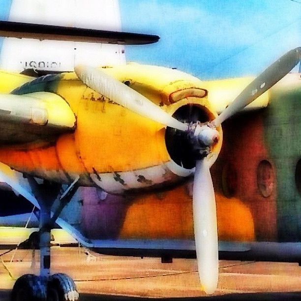 transportation, mode of transport, sky, airplane, public transportation, air vehicle, travel, yellow, part of, metal, cloud - sky, no people, cropped, outdoors, close-up, sunset, industry, journey, low angle view, day
