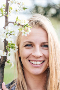 Portrait of smiling young woman outdoors