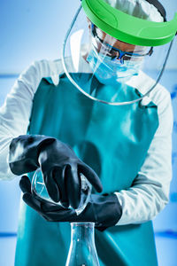 Female scientist experimenting in laboratory