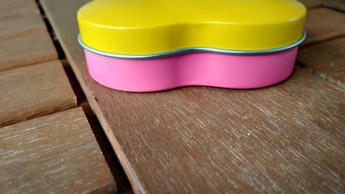 High angle view of multi colored box on table