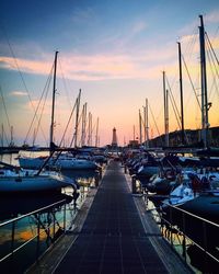 Boats moored at harbor