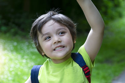 Smiling boy looking away