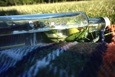 Close-up of water bottle in jar