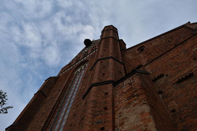 Low angle view of old building against sky