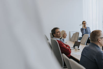 Business people sitting in meeting room