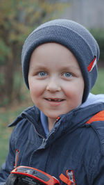 Portrait of cute girl wearing hat