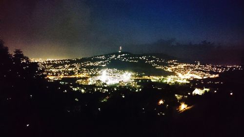 Illuminated cityscape at night