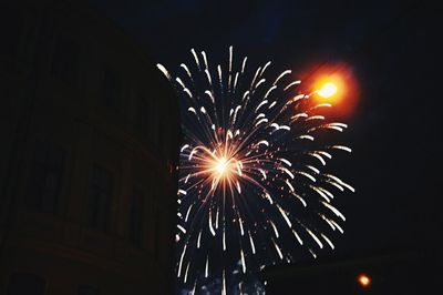 Low angle view of firework display