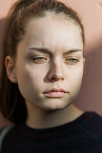 Close-up portrait of young woman