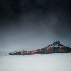 Scenic view of building against sky at night