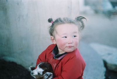 Portrait of cute baby girl during winter