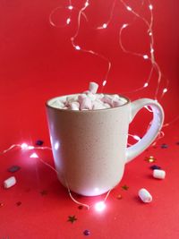 Close-up of coffee cup on table