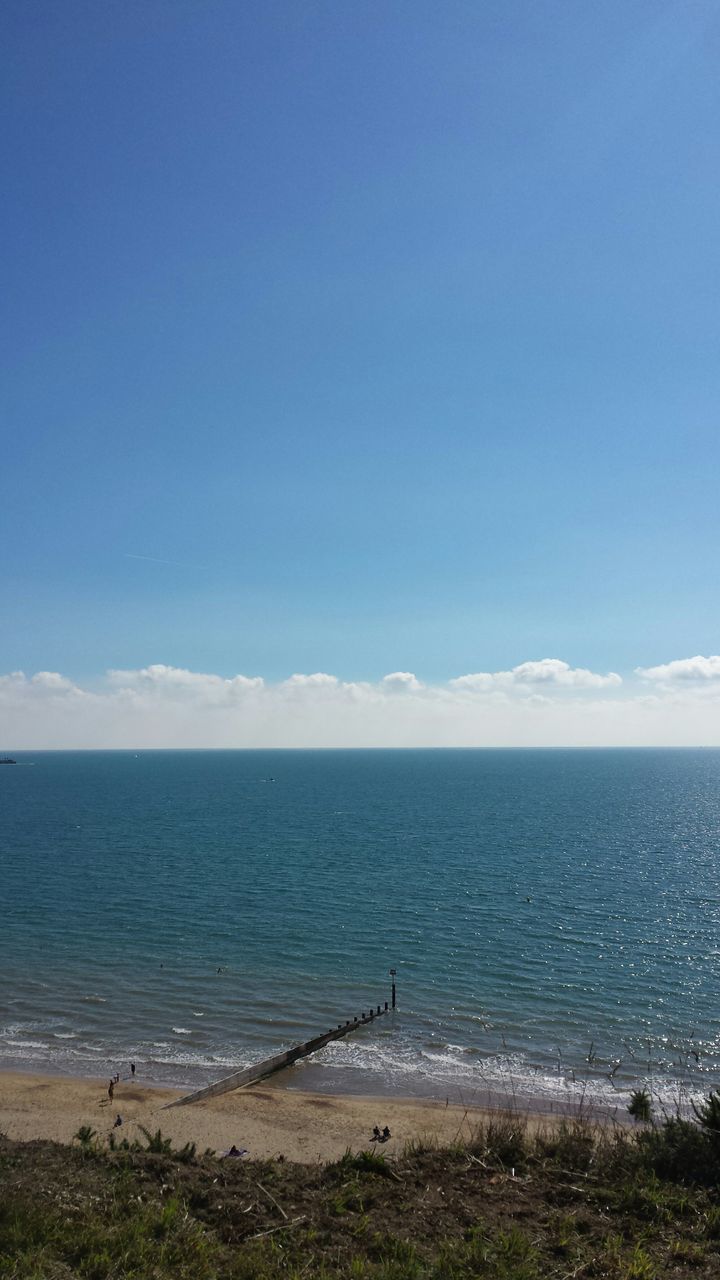 sea, horizon over water, water, tranquil scene, scenics, tranquility, beach, beauty in nature, blue, sky, shore, nature, coastline, idyllic, copy space, sand, remote, non-urban scene, outdoors, day