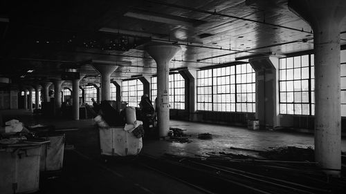 Garbage cans in abandoned building