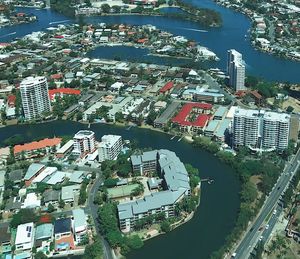 High angle view of buildings and trees in city