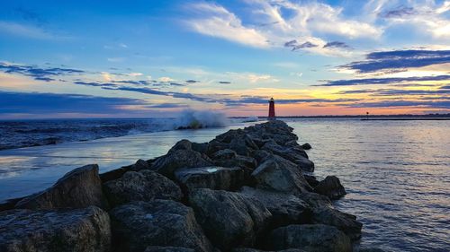 Scenic view of sea against sky during sunset