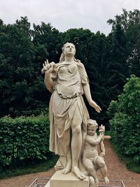 Low angle view of statue against sky