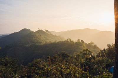 Scenic view of mountains against sky during sunset