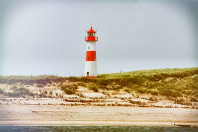 Scenic view of lighthouse on the beach