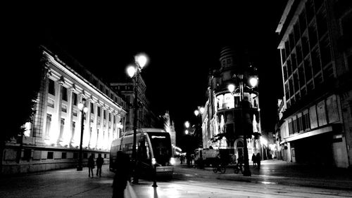 Illuminated street at night