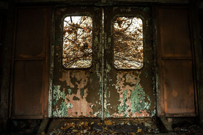 Rusty window of abandoned building