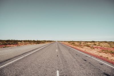 Road against clear sky