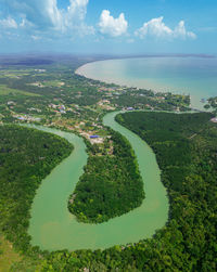 High angle view of road by sea against sky