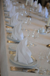 Place setting on dining table during wedding ceremony