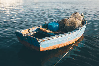 High angle view of boat moored on lake