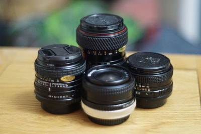 Close-up of camera lens on table