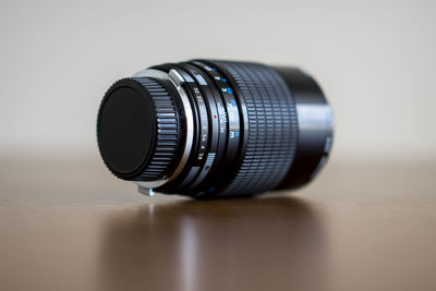 Close-up of camera on table