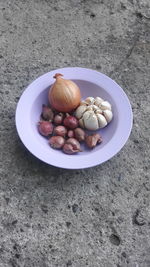 High angle view of fruits in plate on table