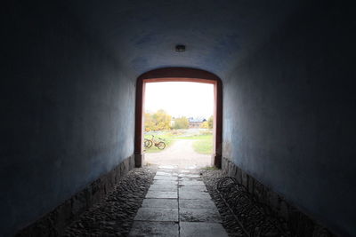 View of field seen through tunnel at suomenlinna